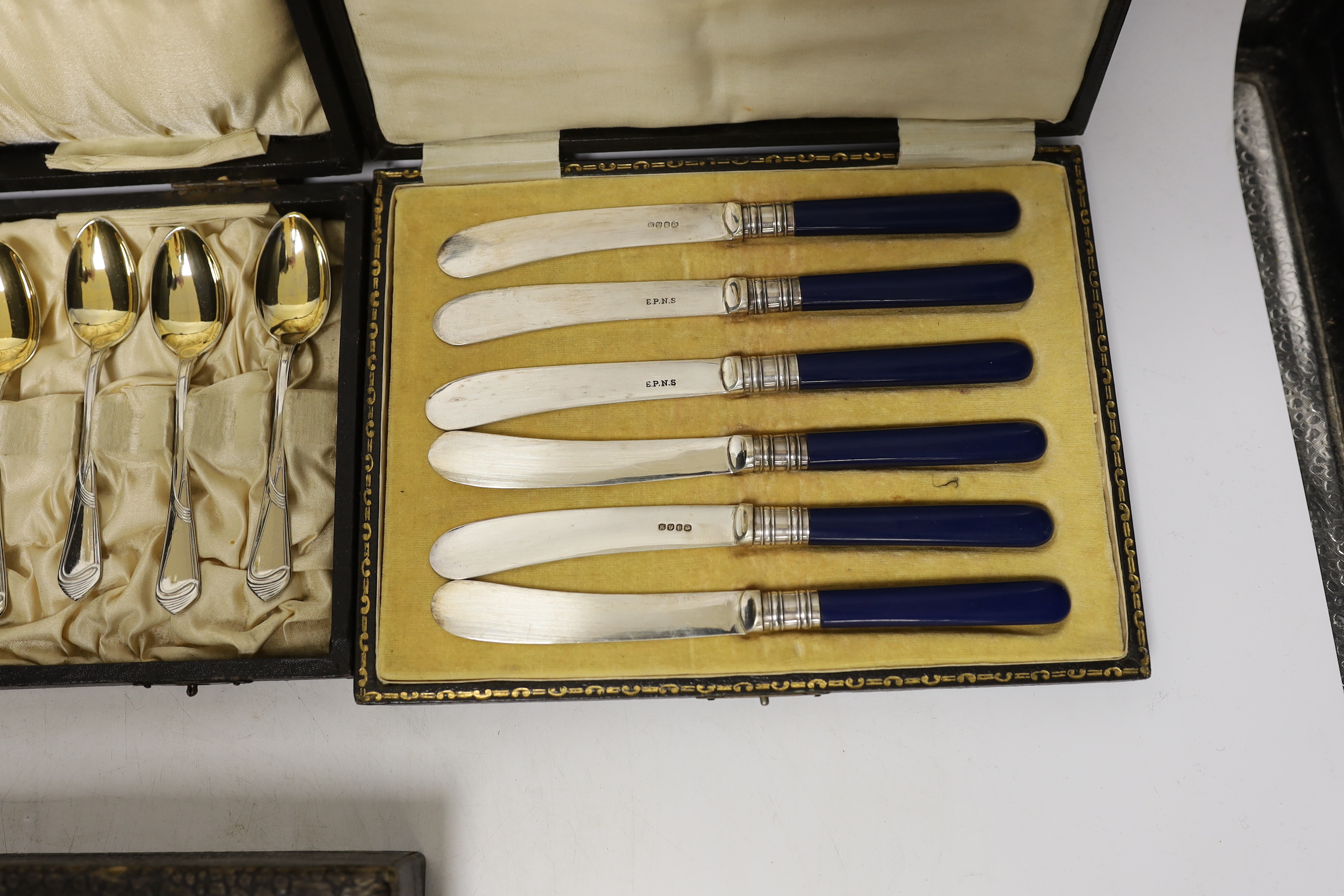 Four cased Continental cutlery sets, one 800 standard